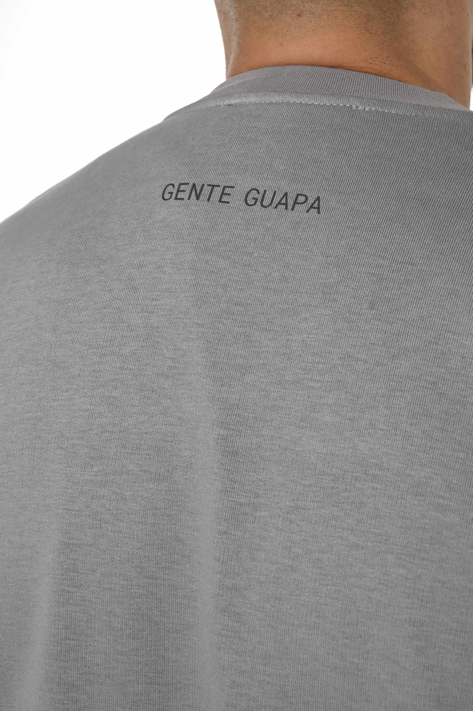 Gente Guapa black hoodie with “Did we finally learned what world would say” quote — unisex streetwear logo view